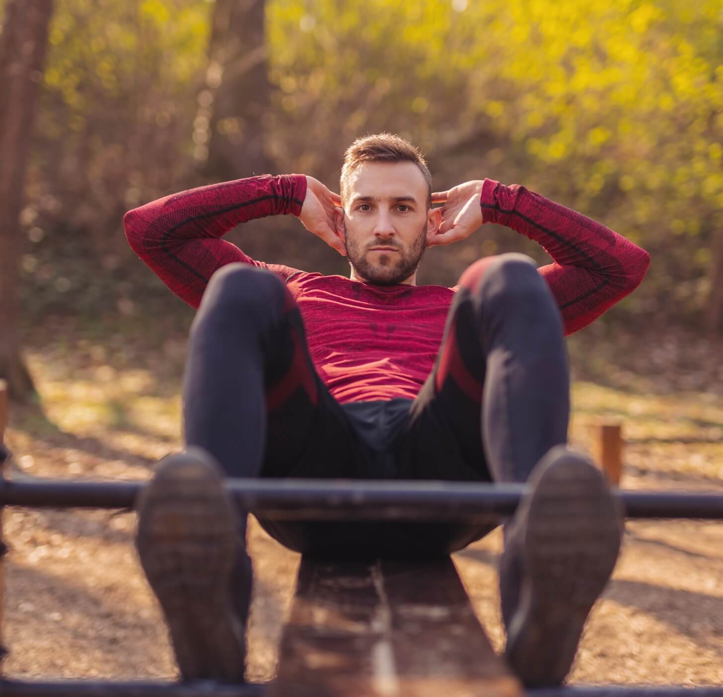 active-man-working-out-outdoors-doing-crunches-2025-03-13-03-46-43-utc (1)