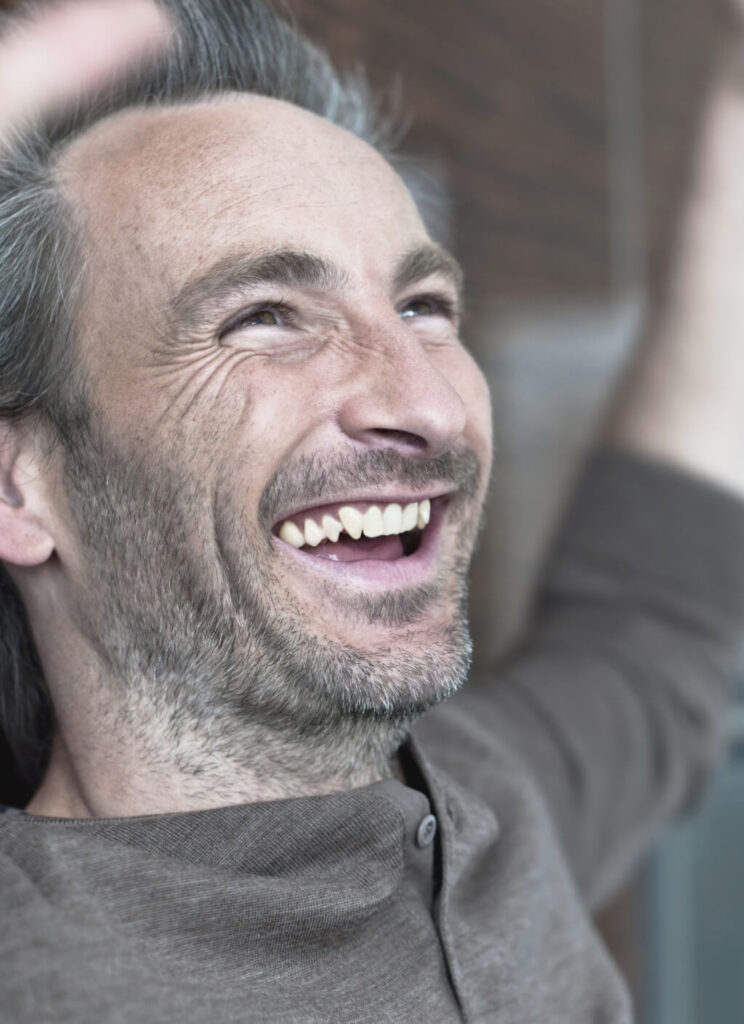 germany-hamburg-man-cheering-and-laughing-portr-2024-09-18-15-14-27-utc (1)
