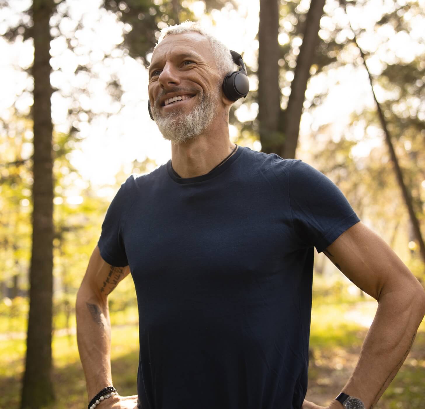 happy-fit-man-listening-to-music-in-wood-2023-11-27-05-18-23-utc (1)